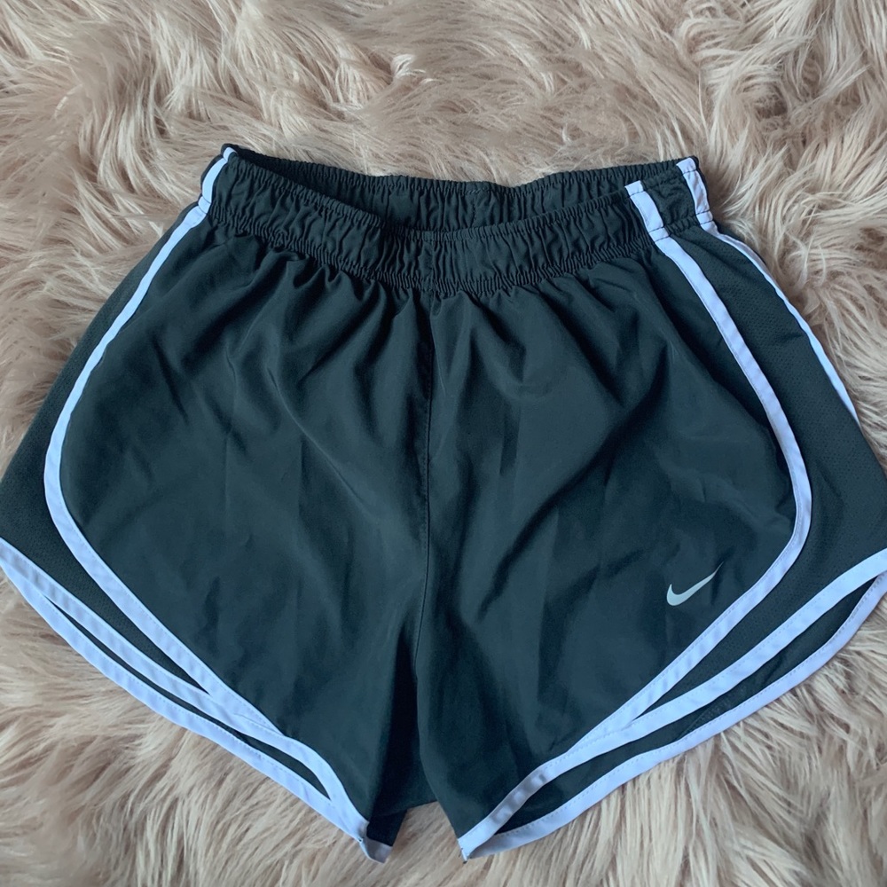 Dark grey and white Nike running shorts